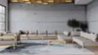 Skandinaviško stiliaus poilsio zona su modulinėmis smėlio spalvos sofomis, mediniais rėmais, betonine siena ir abstrakčiu kilimu