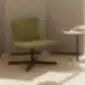 Xail XAI0030 poilsio kėdė iš INCLASS su žaliais apmušalais ir juodu besisukančiu pagrindu.